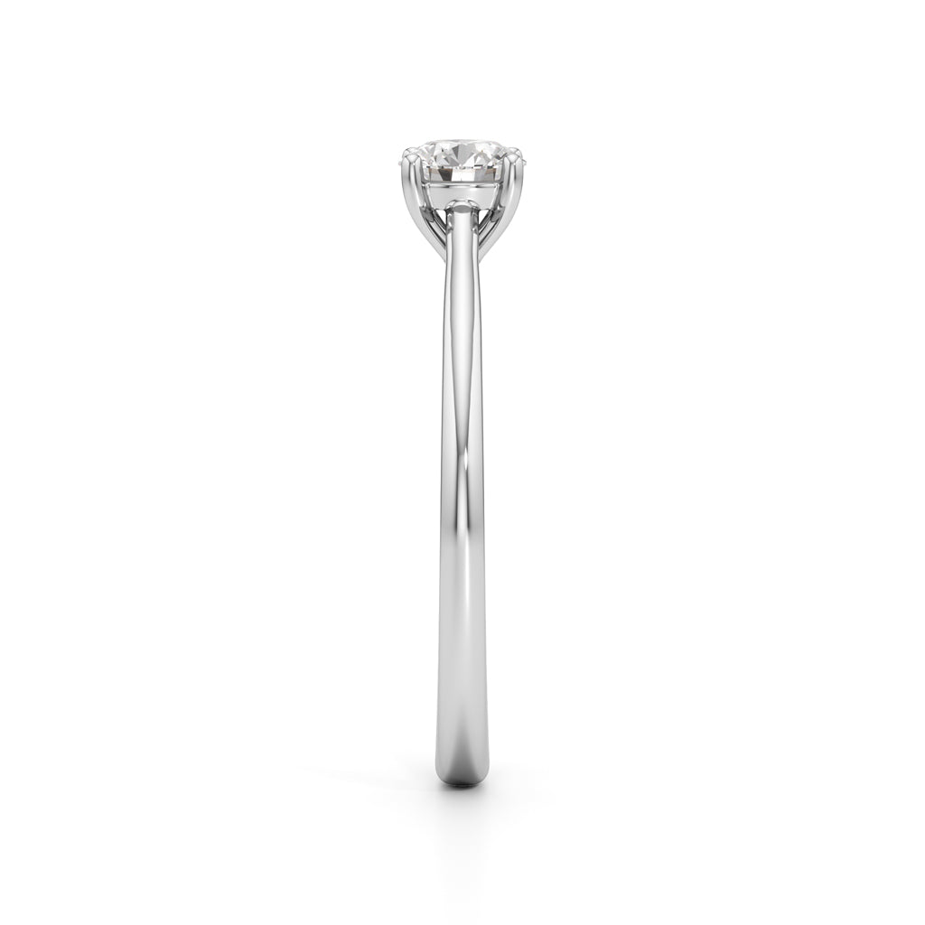 Solienara four prong round cut solitaire ring