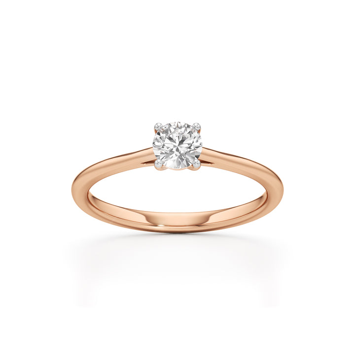 Solienara four prong round cut solitaire ring