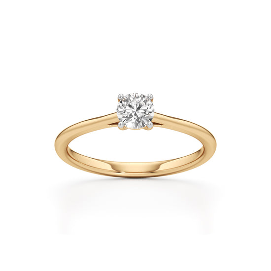 Solienara four prong round cut solitaire ring
