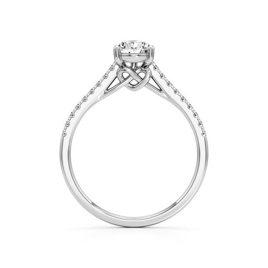 Teardrop Grace – 0.71 Ct Pear Shape Side Stone Ring