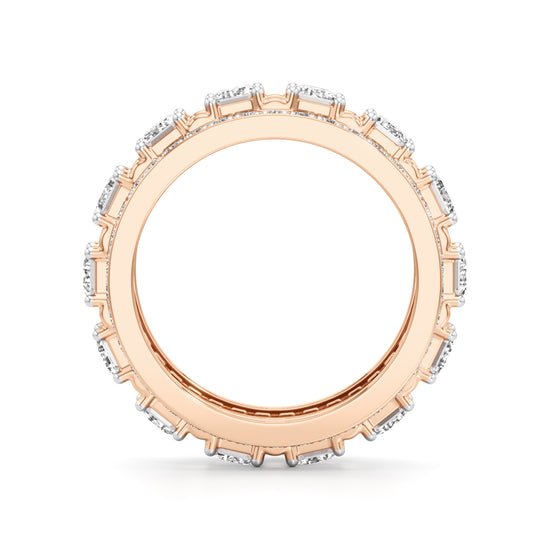 The Radiant Majesty Baguette Diamond Eternity Band with Pave Halo Accents