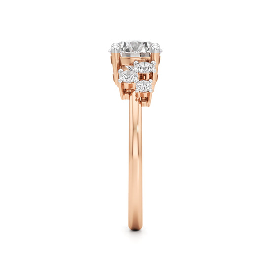 Round Solitaire with Cluster Side Stones Ring